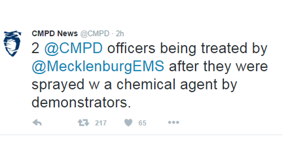 Tweet: "2 @CMPD officers being treated by @MecklenburgEMS after they were sprayed w a chemical agent by demonstrators"