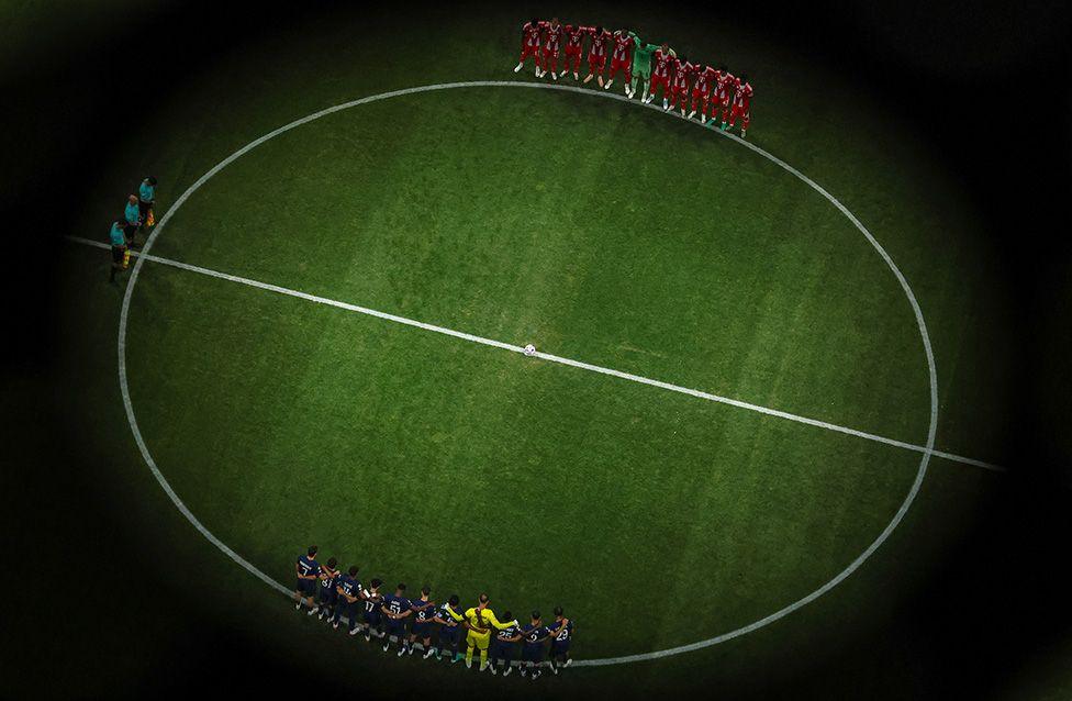 Players, match officials and fans pause for a moments silence in memory of former football player Diogo Jota and his brother Andre Silva, who passed away on the 3rd of July 2025. Photo by Patrick Smith