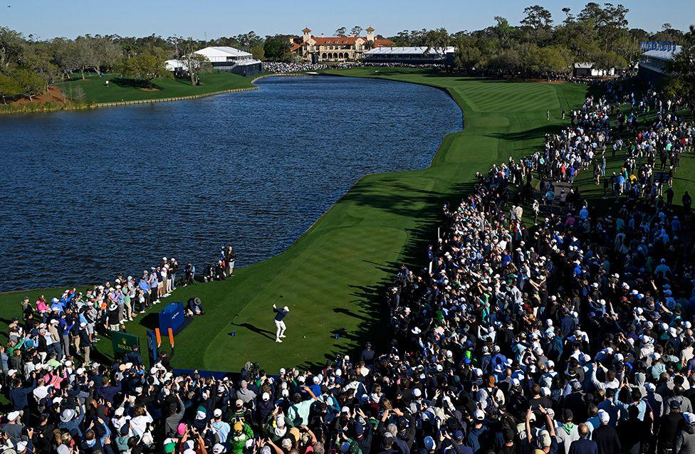 Rory McIlroy hits a tee shot on the 18th hole during a play-off in the final round of The Players Championship at TPC Sawgrass on 17 March 17 in Ponte Vedra Beach, Florida.