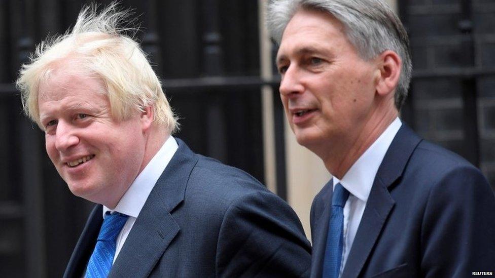 Boris Johnson and Philip Hammond leave a cabinet meeting in 2017