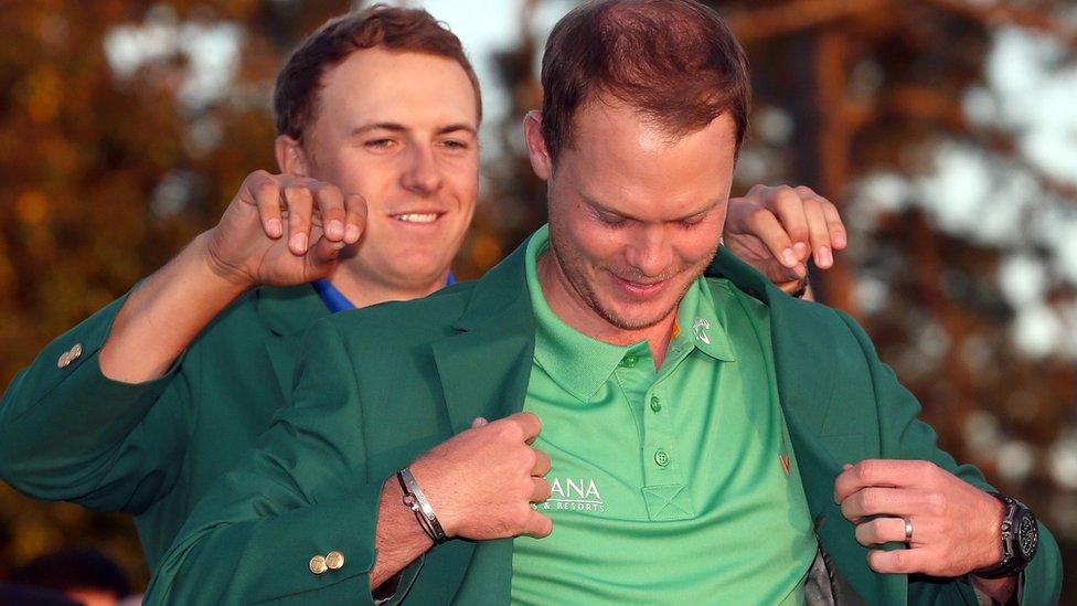 Danny Willett dons a green jacket after winning the wins the 2016 Masters