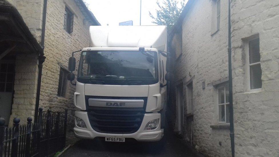 Lorry wedged in lane