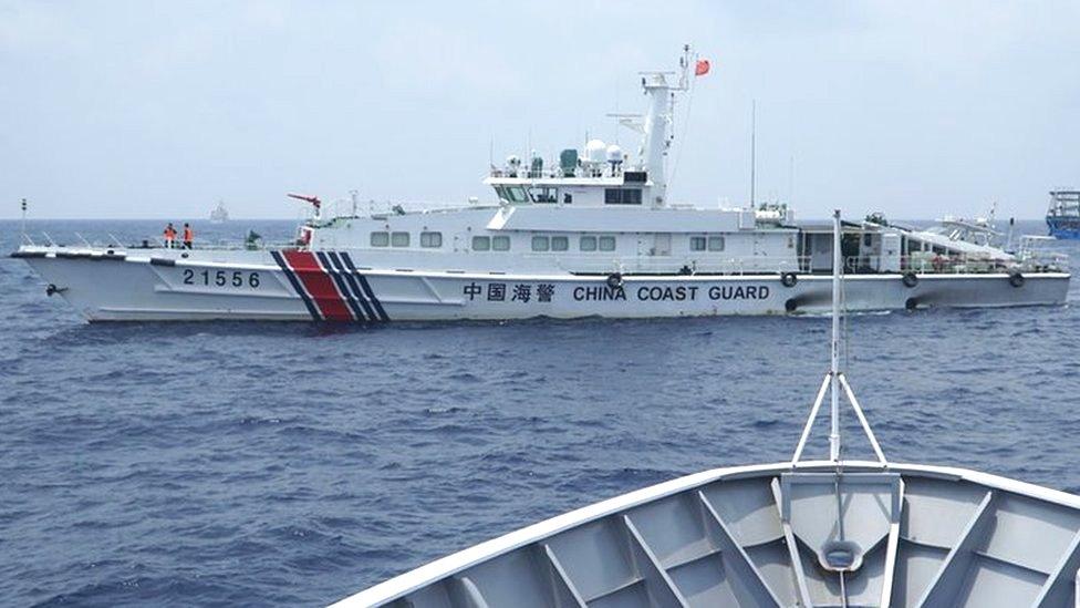 China coast guard and militia ships as seen from Philippine coast guard ship