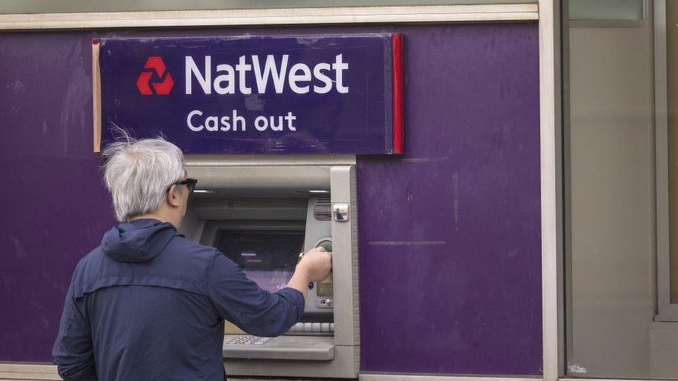 Customer using NatWest ATM