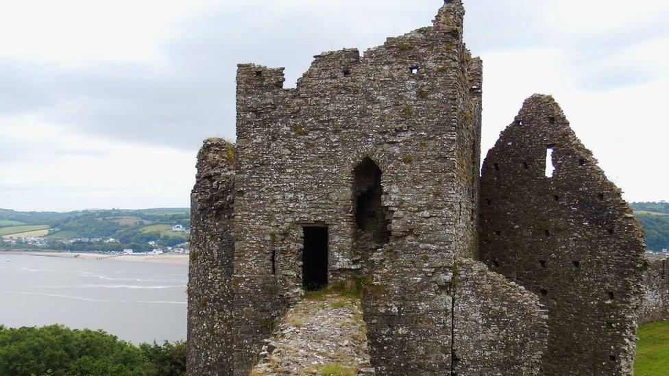 Llansteffan Castle, in Carmarthenshire, with a view of the estuary towards ferryside