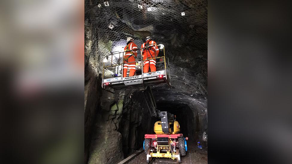 workers in tunnel