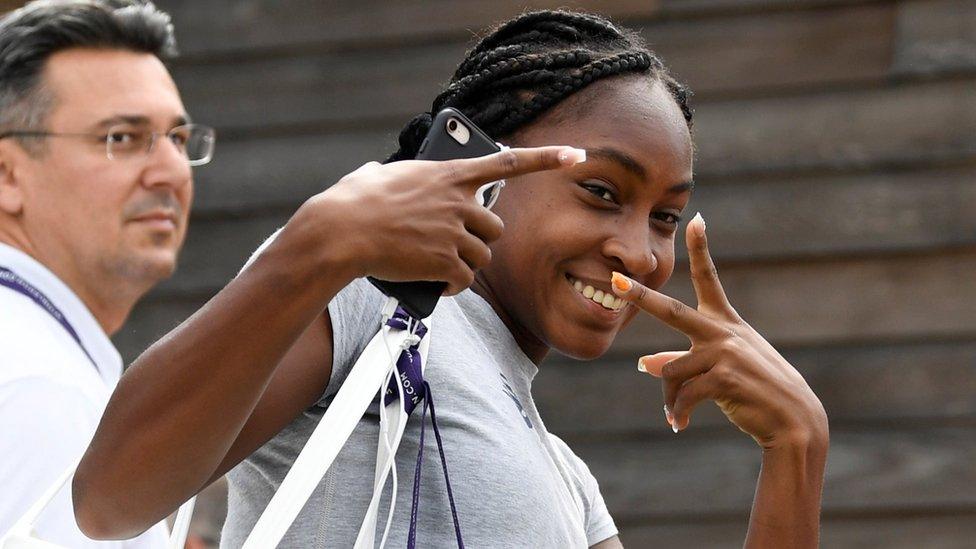 Cori Gauff of the U.S. gestures as she arrives for a practice session