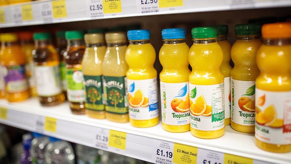 Drinks in plastic bottles for sale in a shop