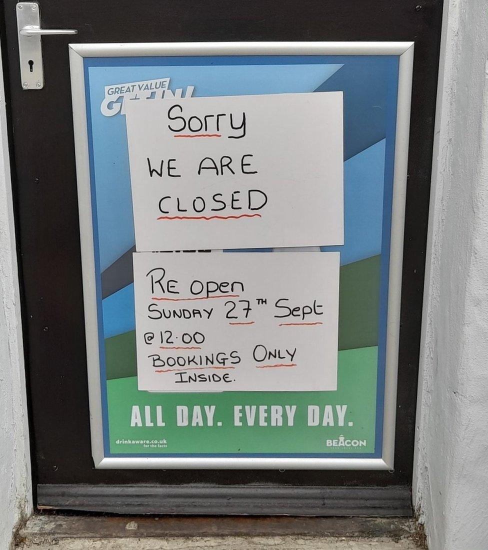 Sign on Commercial door