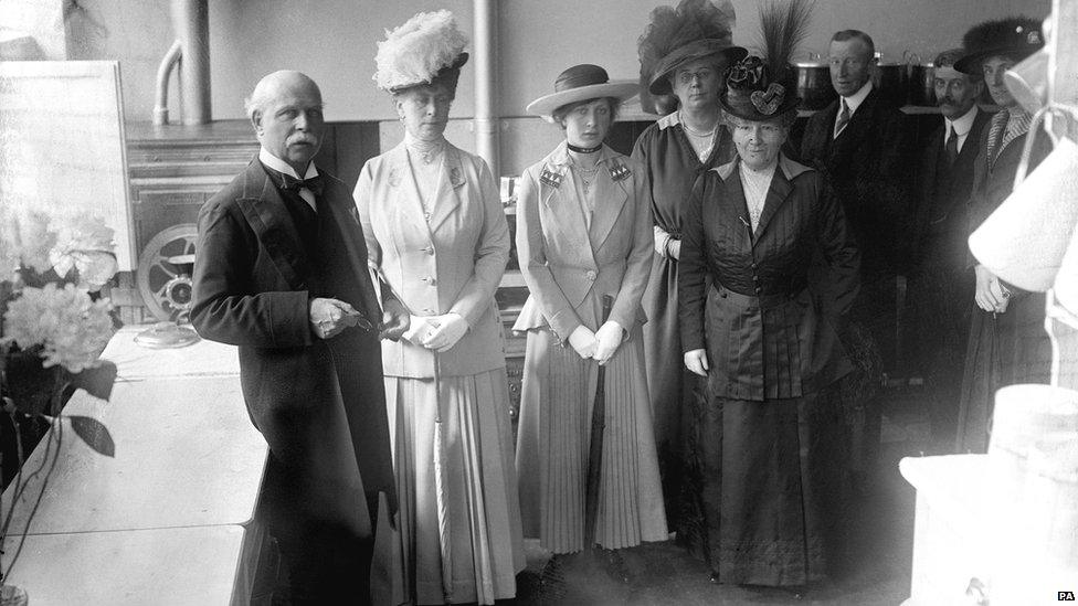 Queen Mary at the opening of the first National Kitchen, Westminster Bridge Road, 21 May 1917