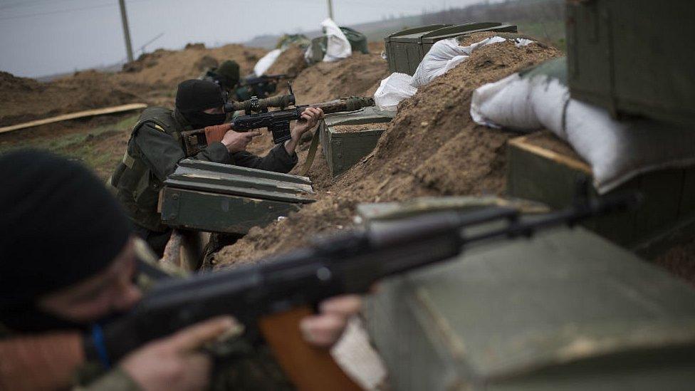 Ukrainian servicemen guard position in village of Berdyanske near Shyrokyne, eastern Ukraine. 14 April 2015