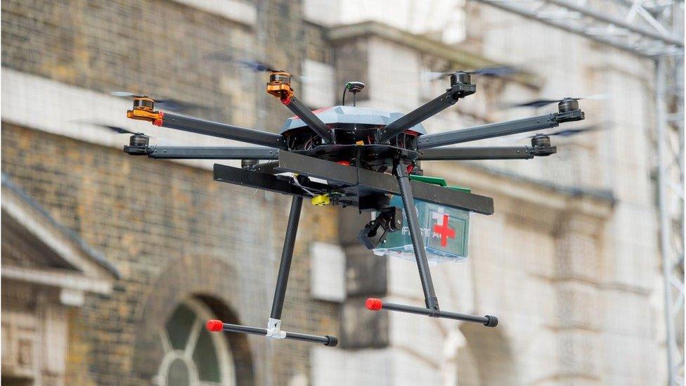 A drone delivering first aid supplies