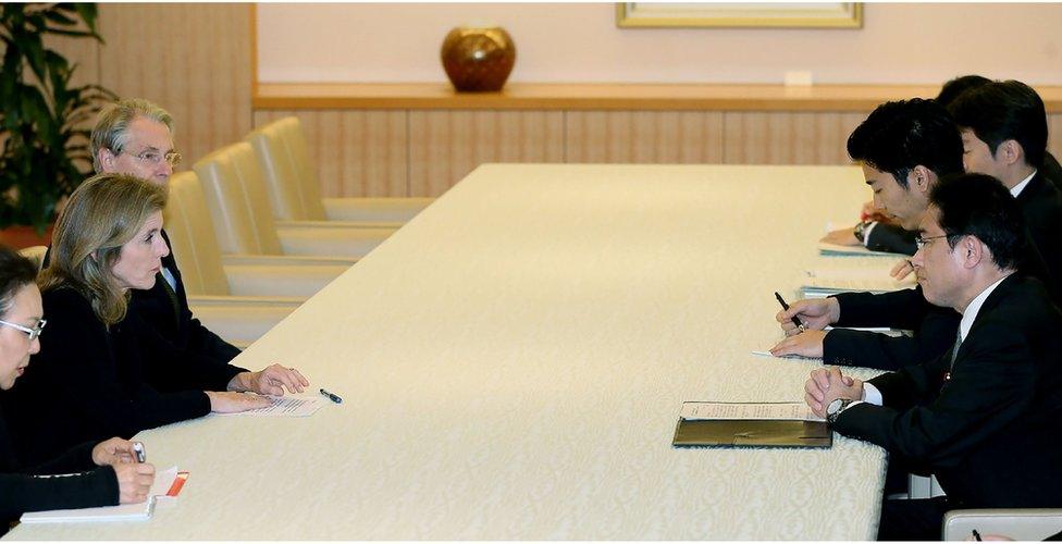 US Ambassador to Japan Caroline Kennedy (second left, flanked by one man and one woman) meets with Japanese Foreign Minister Fumio Kishida (first right, flanked by other male officials) at the Foreign Ministry on 19 May 2016