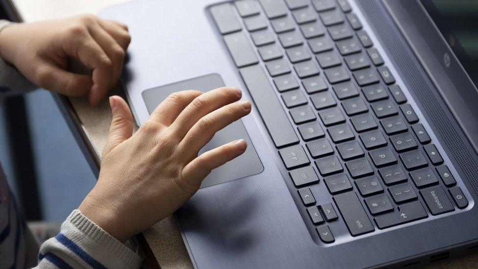 Child with laptop