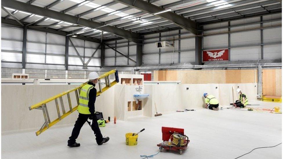 Work to create a temporary hospital at the Scarlets rugby stadium in Llanelli