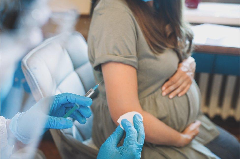 pregnant woman getting vaccine