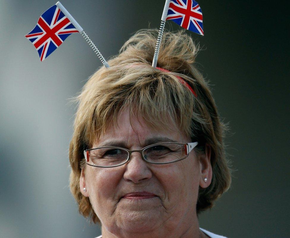 A member of the public gets an early vantage point to view the procession and the Royal wedding of Zara Phillips and Mike Tindall at The Palace of Holyroodhouse on July 30, 2011