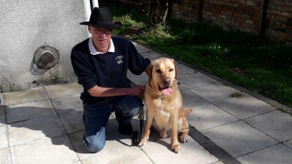 Roy Richards with guide dog Jones