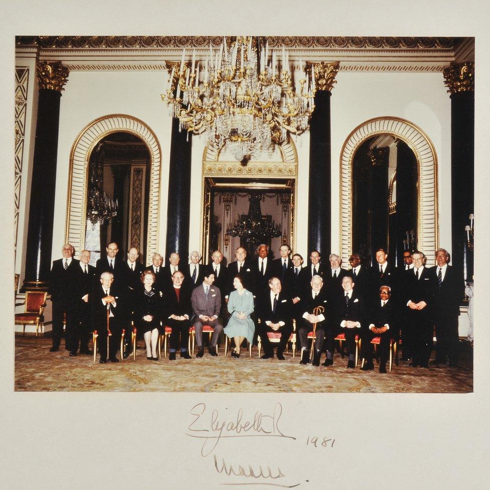 An official colour photograph of the Queen and Prince Charles with members of the Privy Council after a meeting at Buckingham Palace on 27 March 1981