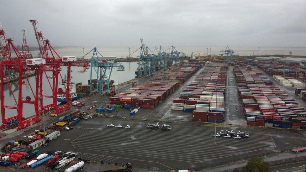 General view of stacked shipping containers at Peel Ports Liverpool docks in Liverpool