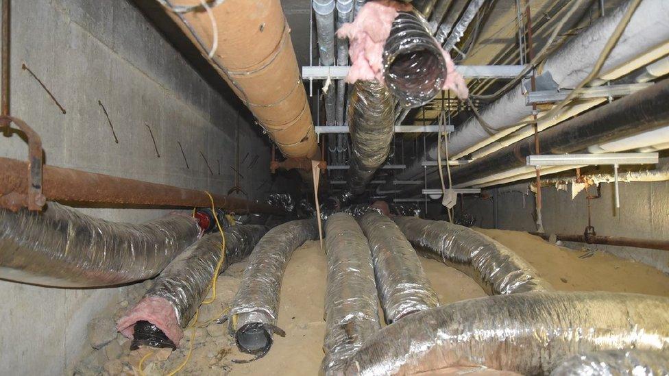 Photo of ducts set up underneath the school where the crypto mining operation took place