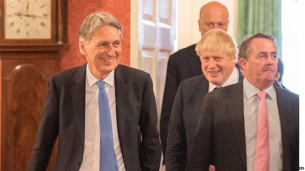 Philip Hammond, Boris Johnson and Liam Fox in Downing Street