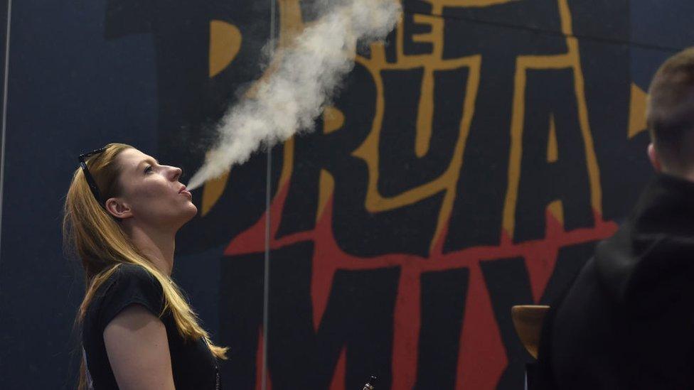 A visitor tries out flavoured e-liquids at the Vape Jam UK 4 at ExCel on April 6, 2018 in London, England