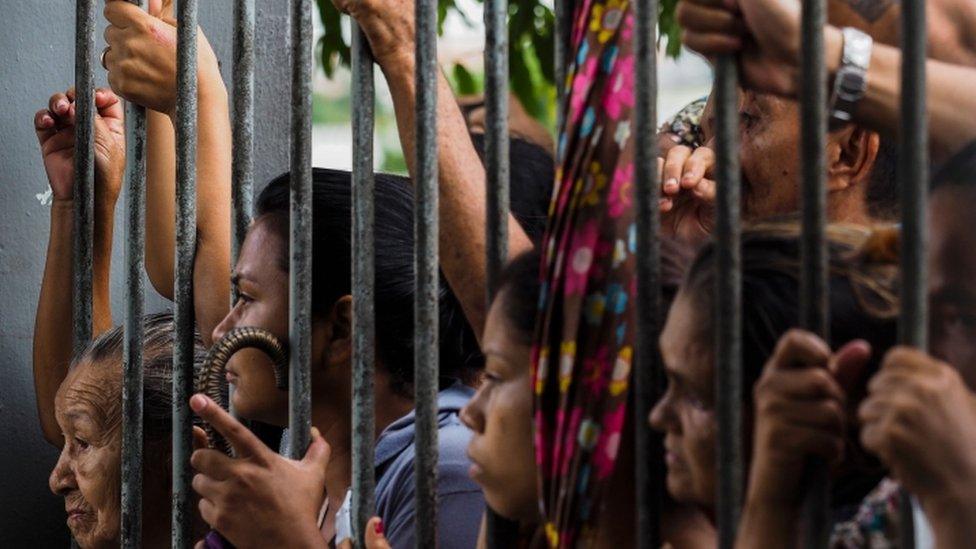 Relatives wait for information at Vidal Pessoa Public Jail, on January 8, 2017, in Manaus, Amazonas, Brazil