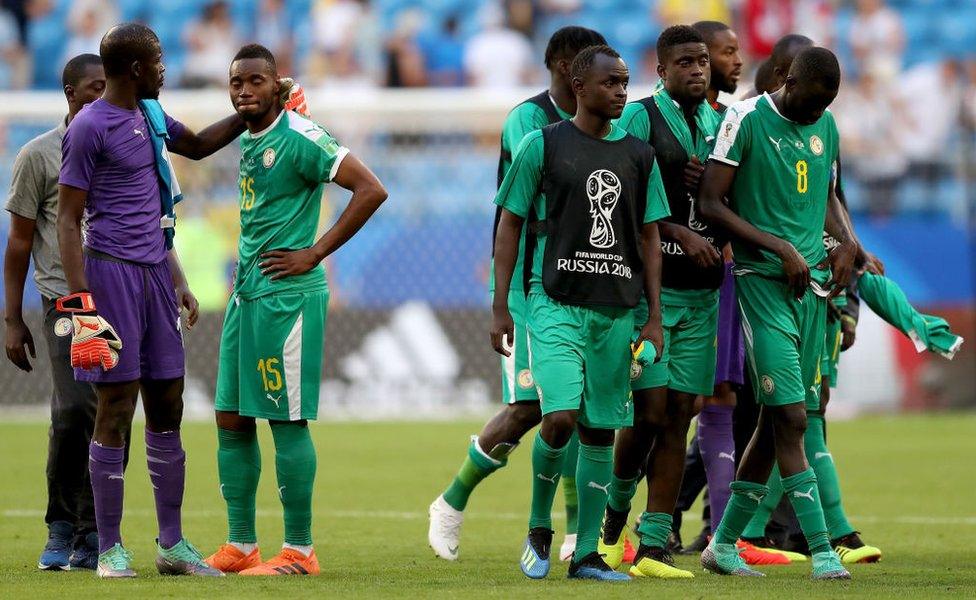 Khadim Ndiaye of Senegal consoles teammate Diafra Sakho of Senegal following their sides defeat in the 2018 FIFA World Cup Russia group H match between Senegal and Colombia at Samara Arena on June 28, 2018 in Samara, Russia.