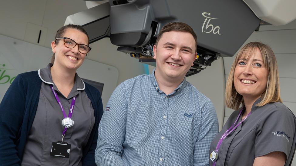 Ryan, pictured with radiographers Kate Leaver and Kerry Owen