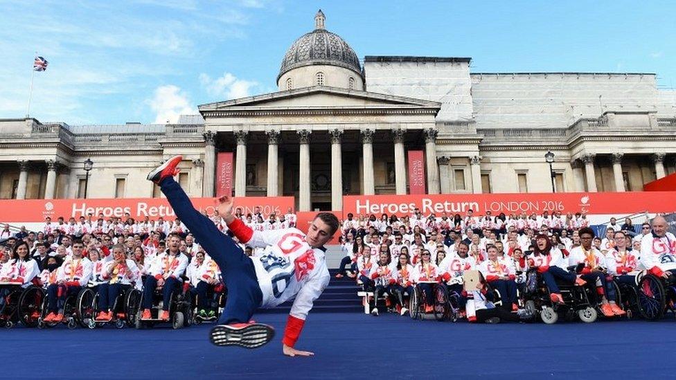 Max Whitlock performs acrobatics on stage at Trafalgar Square