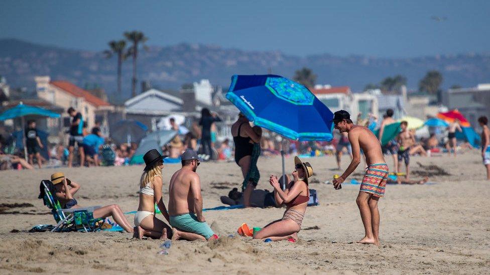 Beach-goers in California