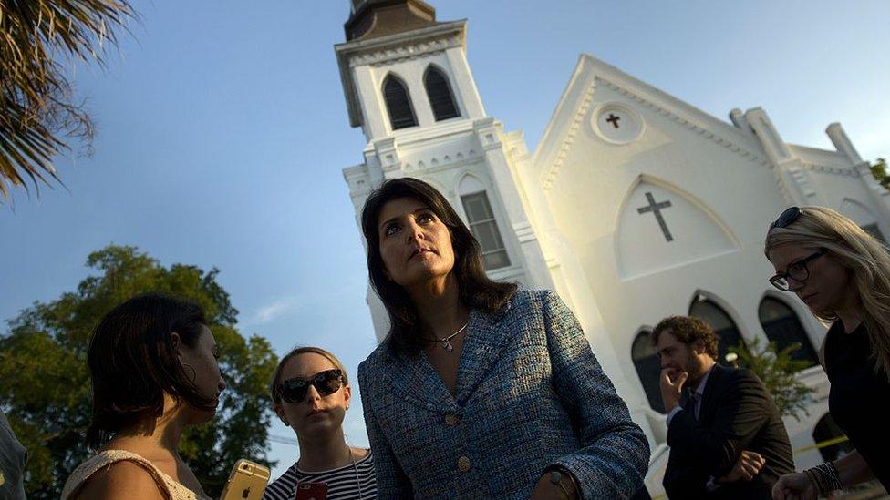 South Carolina Governor Nikki Haley waits to speak to press outside the Emanuel AME Church