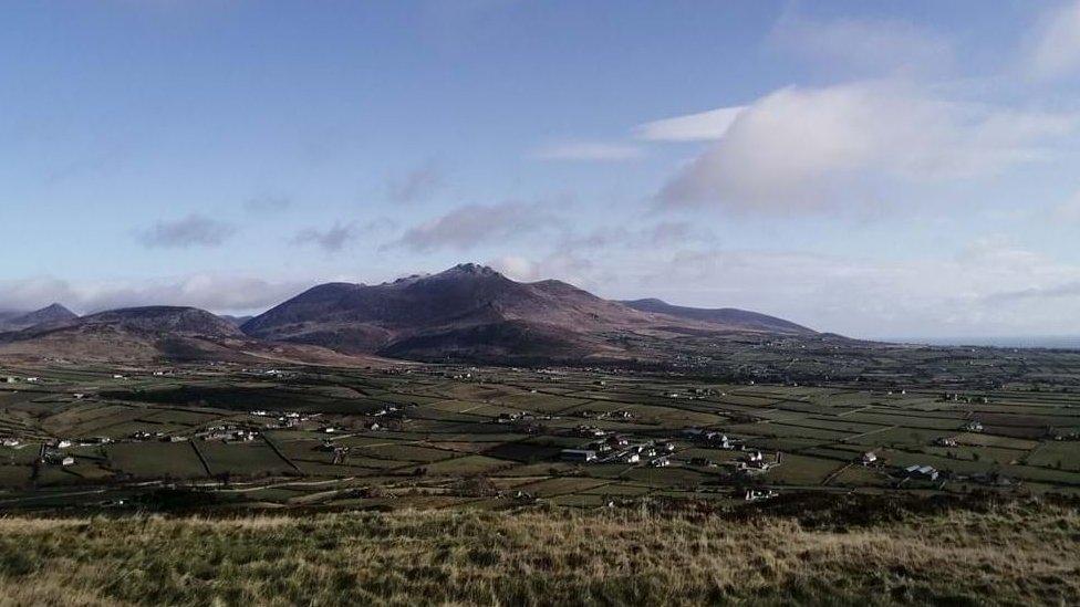 The view across the Mourne Mountains from the new site on Aughrim Hill