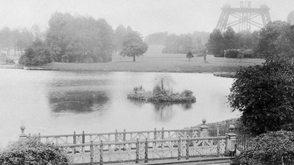 A view of the lake with the tower in the background