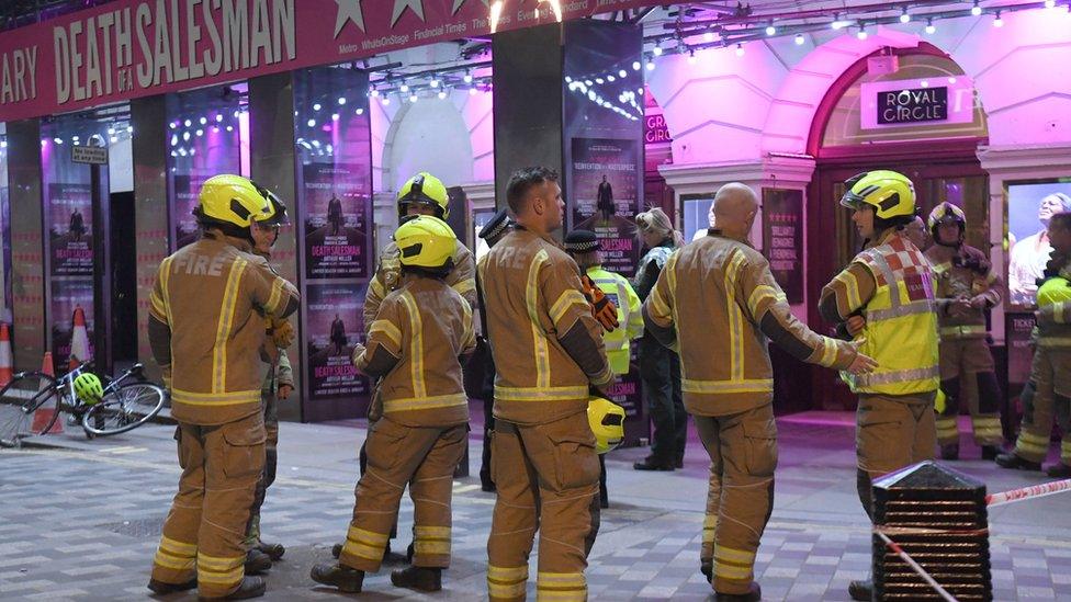 Firefighters outside the Piccadilly Theatre