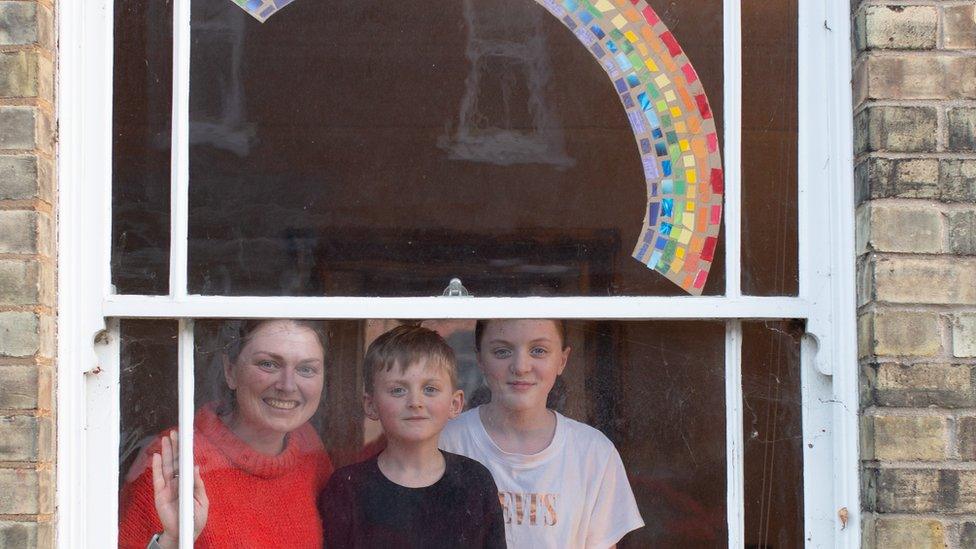 Family at a window