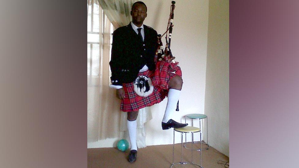 Chukwu Oba Kalu with bagpipes