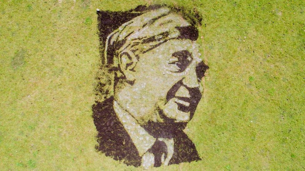 Portrait of NHS founder Aneurin Bevan made out of soil and white stone dust by Artist Nathan Wyburne