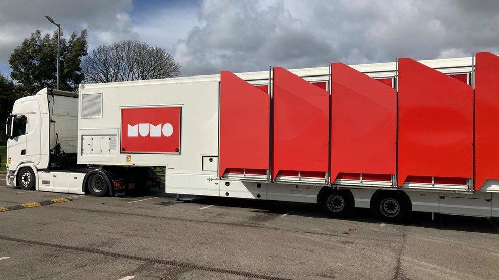 The lorry in a car park