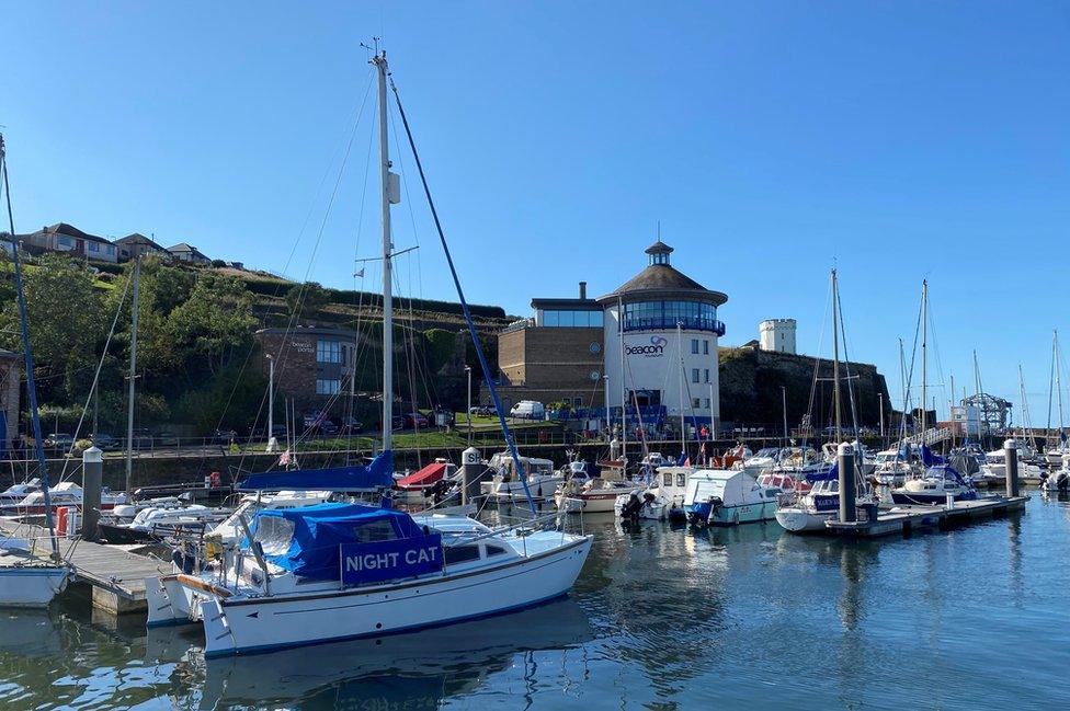 Boats and the marina next to the Beacon Museum