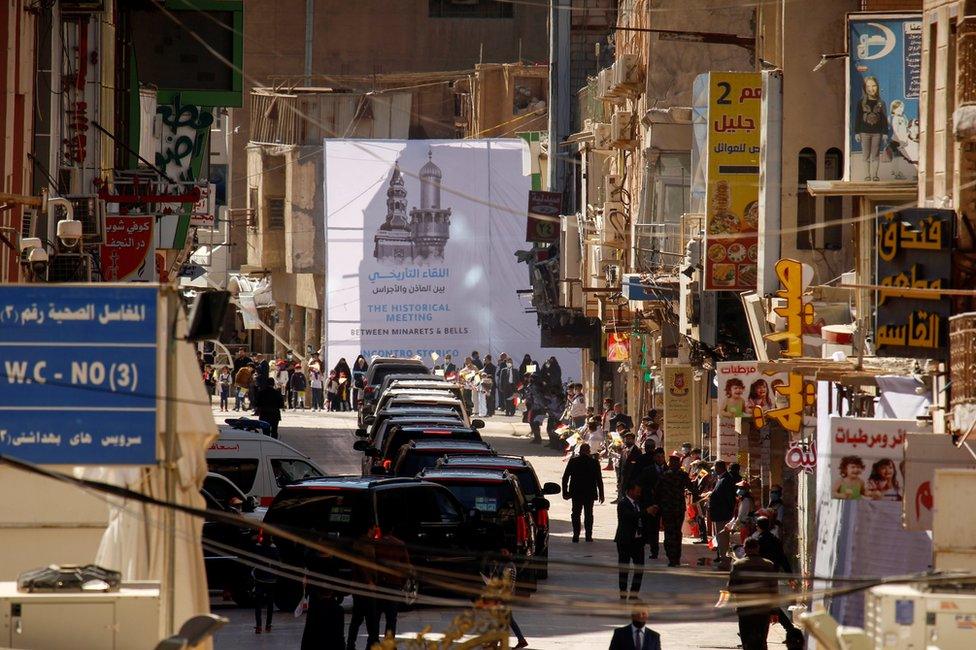 Pope Francis's convoy leaves after his meeting with Grand Ayatollah Ali al-Sistani in Najaf, Iraq March 6, 2021