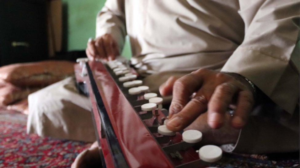 Musician playing in Afghanistan