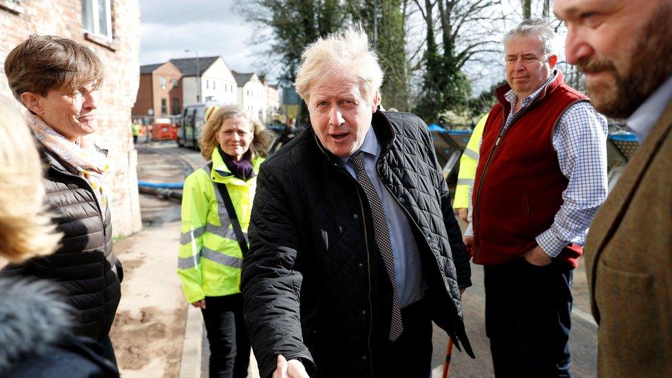 Prime Minister Boris Johnson visits Bewdley in Worcestershire to see recovery efforts following recent flooding in the Severn valley and across the UK