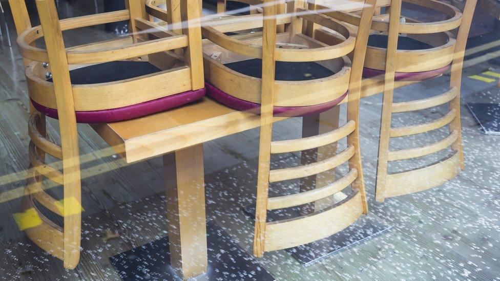 Chairs put up in a restaurant