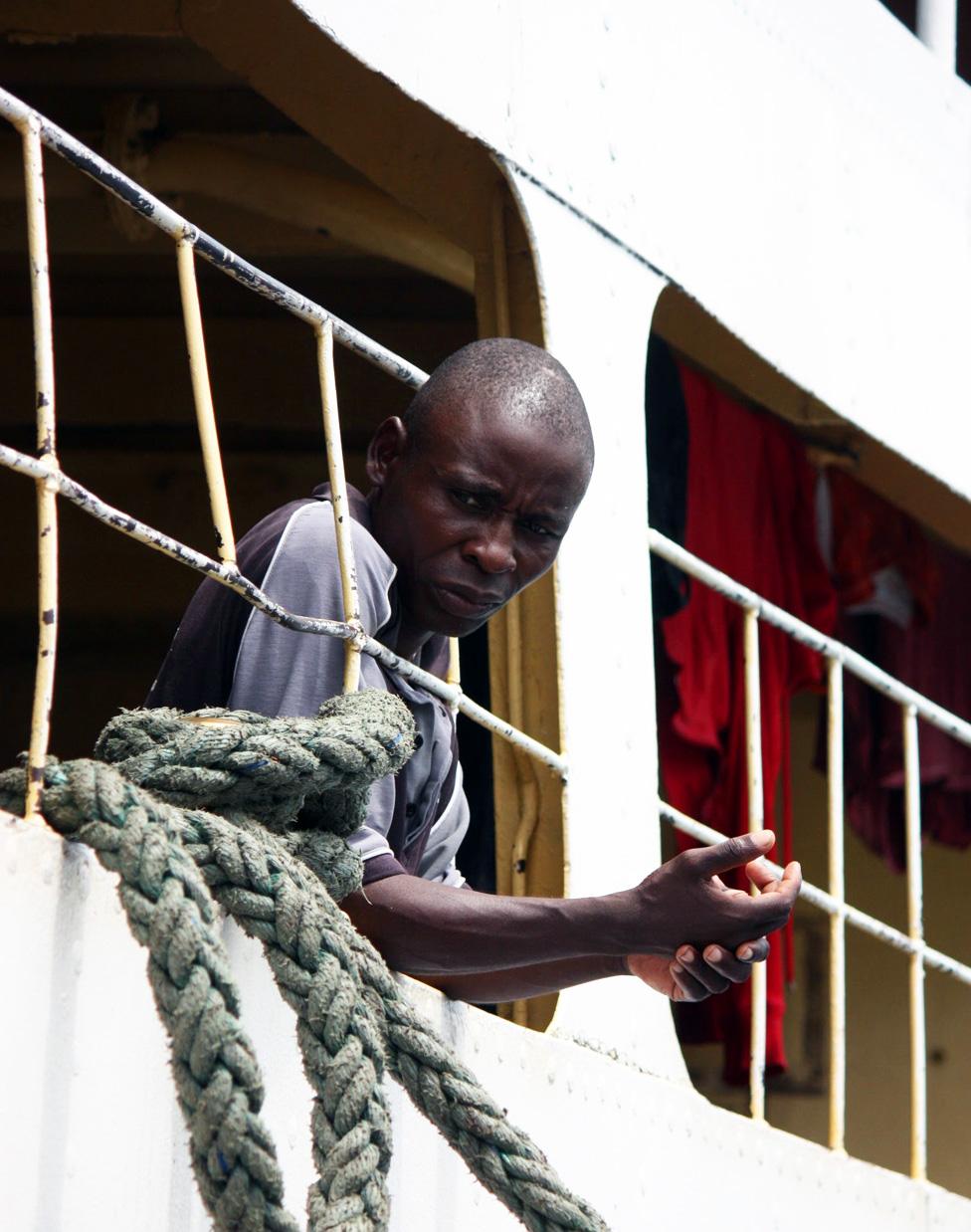 Passenger at side of boat