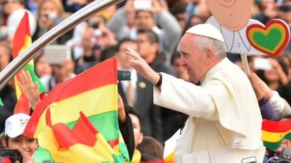 Pope Francis (C) greets the faitfull before offering an open-air mass at the Cristo Redentor Park, in Santa Cruz, Bolivia, 09 July 2015. Pope Francis is on his second day of a visit to Bolivia, part of a tour in South America