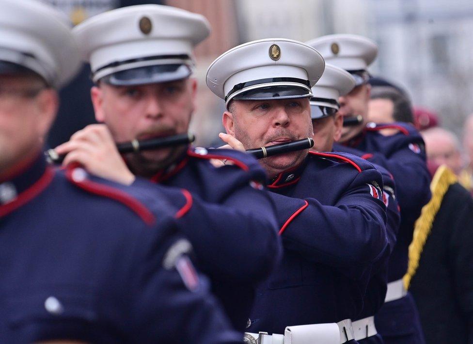 Bandsmen playing their flutes as they march during the Apprentice Boys parade in Londonderry