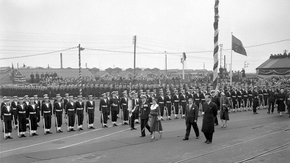 Queen Elizabeth II and the Duke of Edinburgh arrive at Harwich, Essex, to board the Royal Yacht Britannia before leaving on their three day State visit to Holland. March 1958