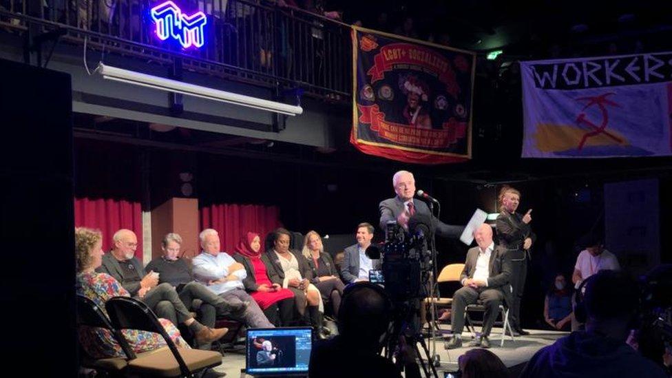 John McDonnell on stage at a World Transformed event